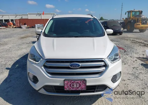 2017 Ford Escape Titanium z USA, uszkodzony, nr VIN 1FMCU0J98HUD49390